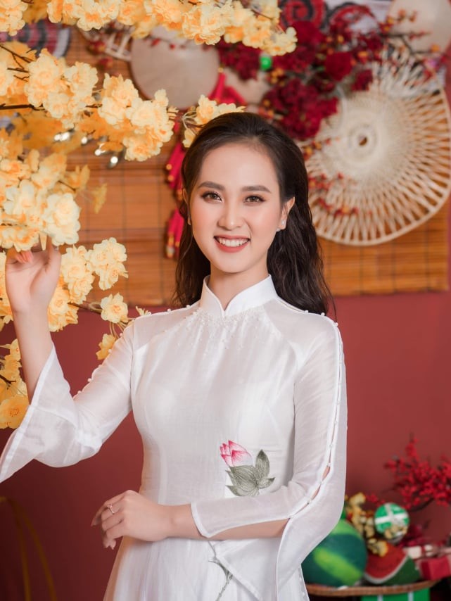 Người đẹp xứ Nghệ rạng rỡ trong bộ ảnh chào Xuân - ảnh 2