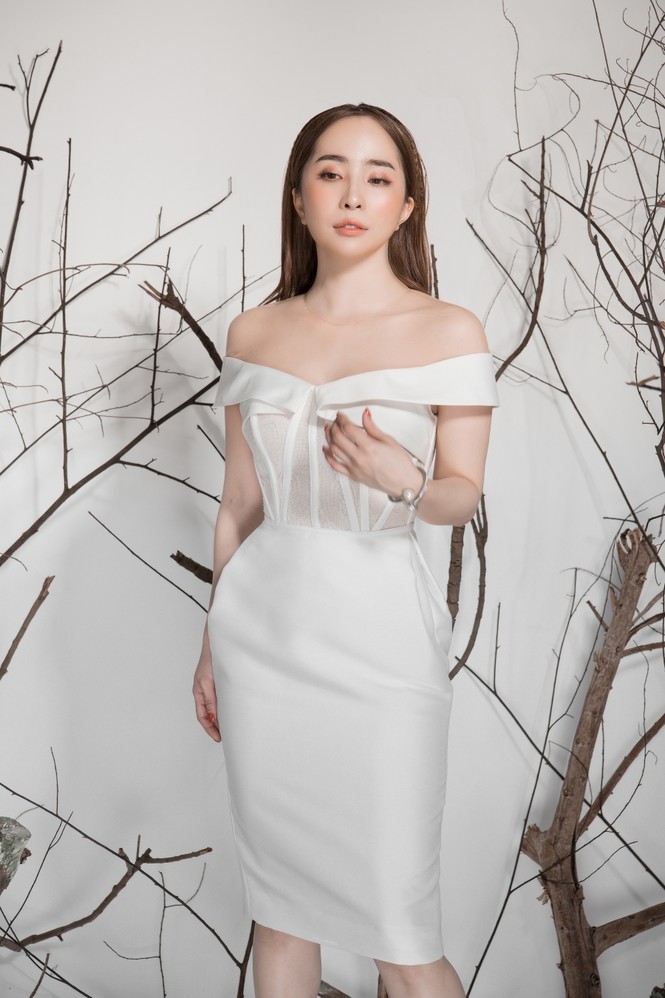 Giảm cân thành công, Quỳnh Nga khoe eo con kiến gợi cảm cùng sắc trắng - ảnh 6
