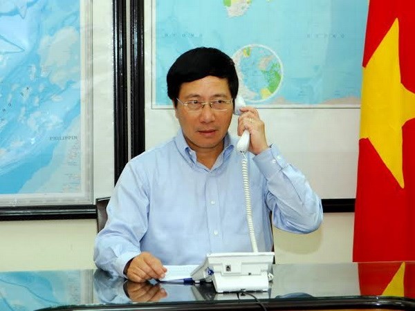 Bộ trưởng Ngoại giao điện đàm với Ủy viên Quốc vụ Trung Quốc - ảnh 1