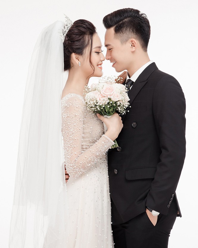 Ảnh cưới lung linh của Top 10 HHVN Tố Như và 'hot boy cảnh sát' - ảnh 2