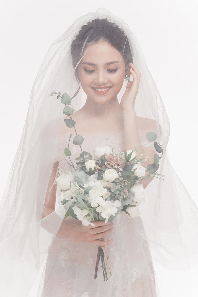 Ảnh cưới lung linh của Top 10 HHVN Tố Như và 'hot boy cảnh sát' - ảnh 7