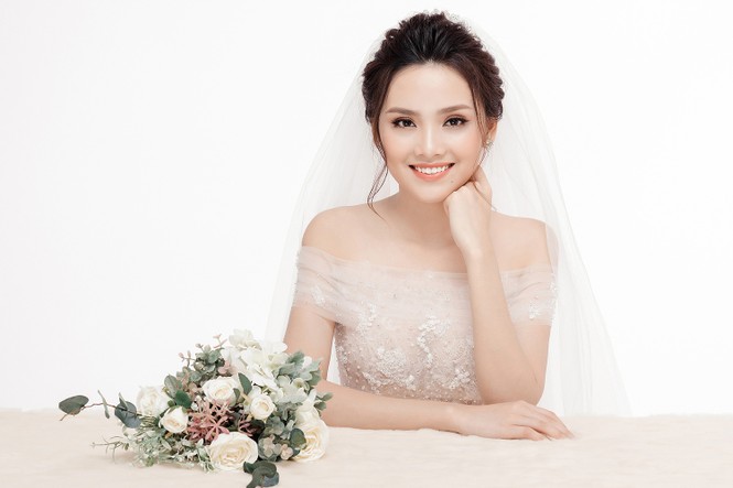 Ảnh cưới lung linh của Top 10 HHVN Tố Như và 'hot boy cảnh sát' - ảnh 10