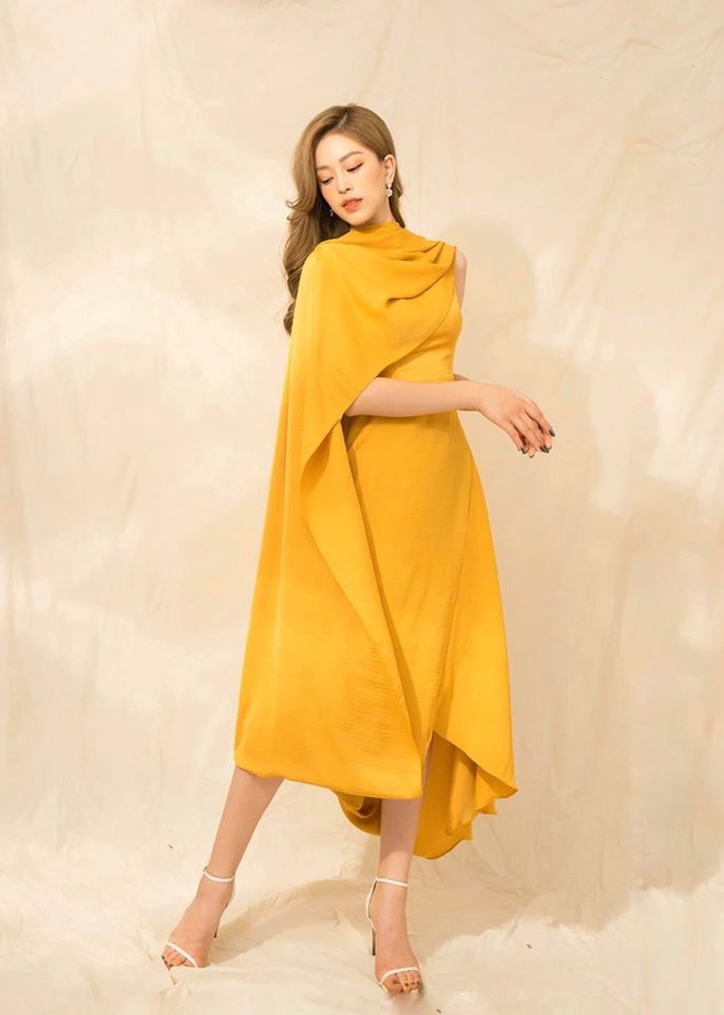 Hoa hậu Lương Thuỳ Linh khoe vòng một gợi cảm với váy trễ vai đỏ rực - ảnh 7