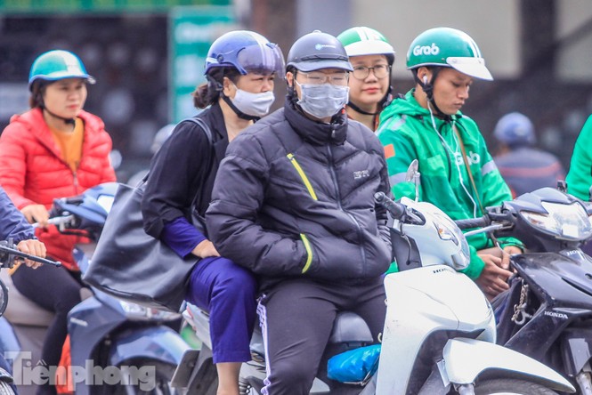 Hà Nội đón không khí lạnh: 'Đã nghe rét mướt luồn trong gió' - ảnh 11