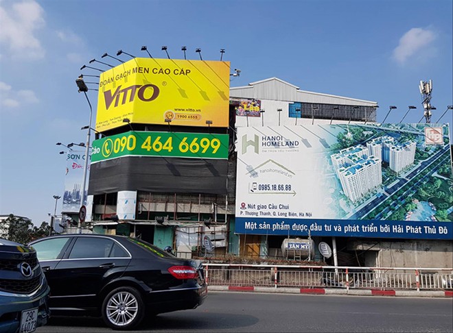 Nhếch nhác vì tràn lan quảng cáo lậu - ảnh 1