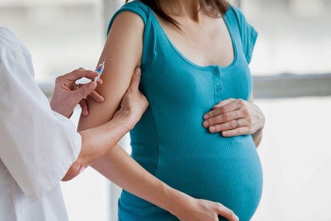 Các loại vắc xin tiêm cho bà bầu có thể gây những phản ứng gì? - ảnh 1