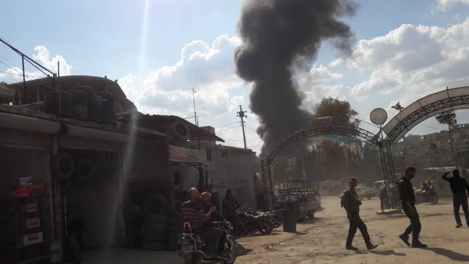 Hiện trường vụ nổ bom xe ở Syria khiến gần 100 nguời thương vong - ảnh 1