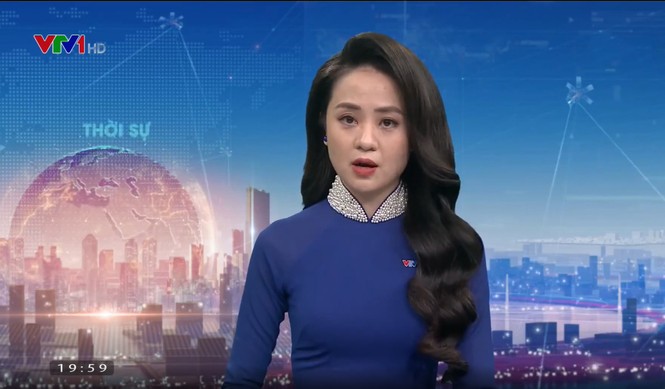 Nhan sắc BTV Thời tiết 9x dẫn bản tin Thời sự 19h - ảnh 2