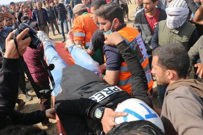 Đưa tin bạo động ở dải Gaza, 13 nhà báo bị thương - ảnh 3
