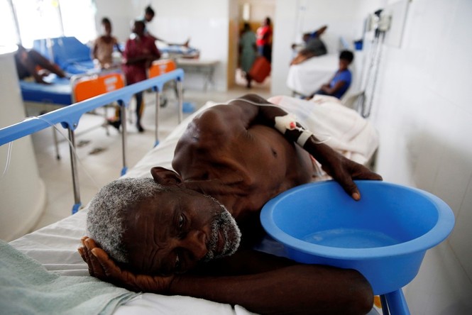 Cảnh tan hoang như thời chiến ở Haiti sau bão Matthew - ảnh 9