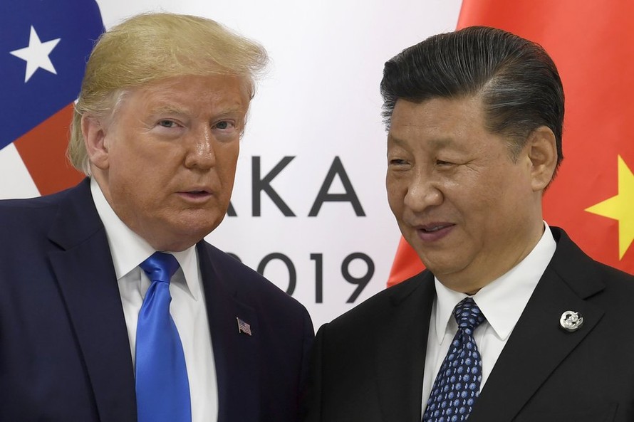 Tổng thống Mỹ Donald Trump (trái) và Chủ tịch Trung Quốc Tập Cận Bình. (Ảnh: Reuters)