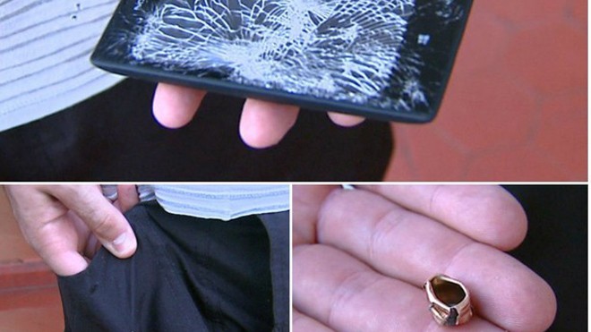 Viên đạn của tên cướp đã bị chiếc Lumia 520 đẩy lệch đường bay. Màn hình của thiết bị này cũng nứt nẻ nghiêm trọng. Ảnh: Globo.