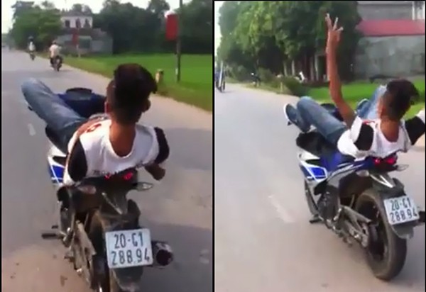 Nam thanh niên đi xe máy bằng chân và không đội mũ bảo hiểm. Ảnh cắt từ clip.