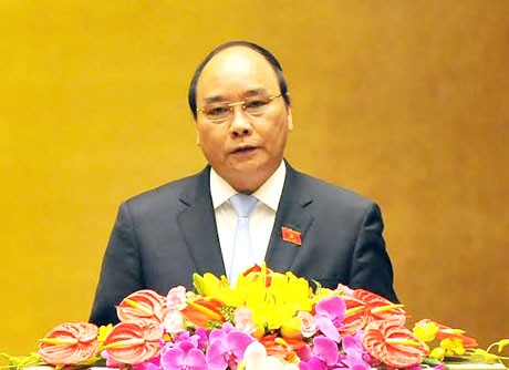 Thủ tướng Nguyễn Xuân Phúc đề nghị Quốc hội miễn nhiệm 20 thành viên Chính phủ. Ảnh Như Ý