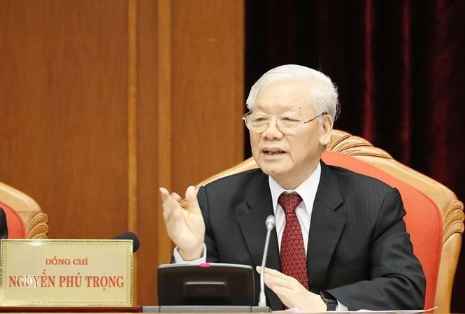 Tổng Bí thư Nguyễn Phú Trọng ký ban hành Nghị quyết số 52 (Ảnh TTXVN)