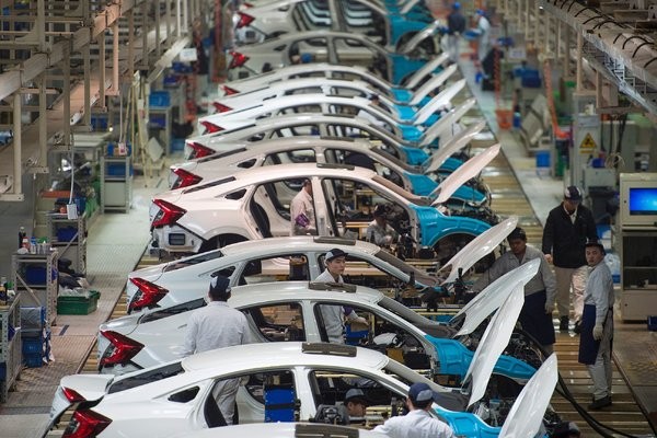Ford tạm dừng hoạt động của nhiều nhà máy trên thế giới. Ảnh: The New York Times