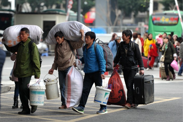 Ảnh: Lao động nhập cư ở ga Phúc Châu, Phúc Kiến, Trung Quốc