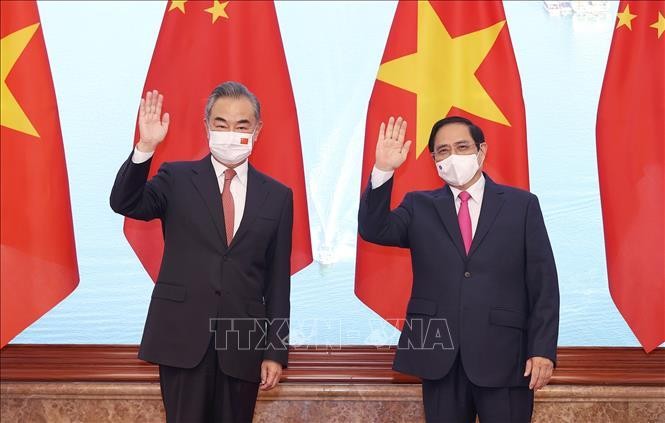Thủ tướng Phạm Minh Chính tiếp Bộ trưởng Ngoại giao Trung Quốc Vương Nghị. Ảnh: Dương Giang/TTXVN