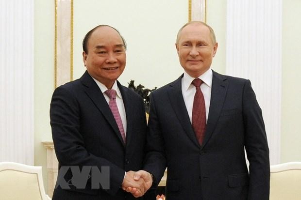 Chủ tịch nước Nguyễn Xuân Phúc hội đàm với Tổng thống Nga Vladimir Putin. (Ảnh: TTXVN)