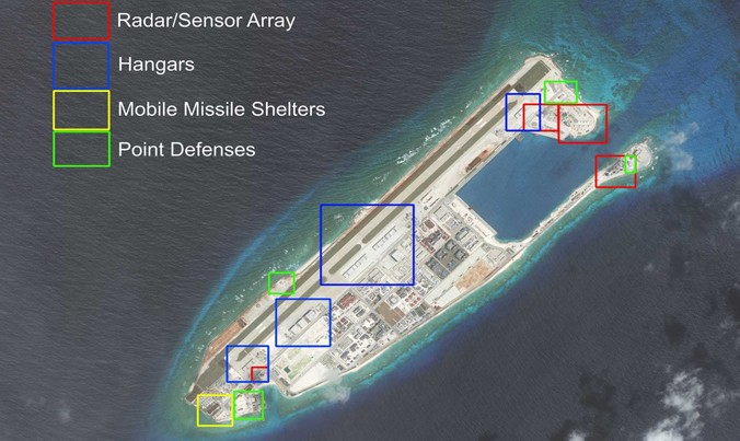 Các hệ thống radar, hầm chứa máy bay, nhà chứa tên lửa di động và điểm phòng ngự mà Trung Quốc xây dựng, lắp đặt trên đá Chữ Thập thuộc quần đảo Trường Sa. Ảnh: AMTI.