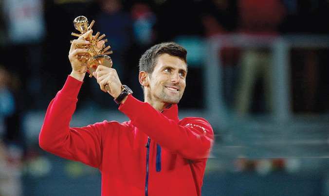Djokovic ăn mừng danh hiệu Madrid Masters, danh hiệu ATP 1000 thứ 29 trong sự nghiệp của anh. Ảnh: GETTY IMAGES 