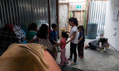 Trẻ em nhập cư từ Mexico và trung Mỹ tại một nhà tình thương ở Tijuana ngày 20/6. Ảnh: AFP.