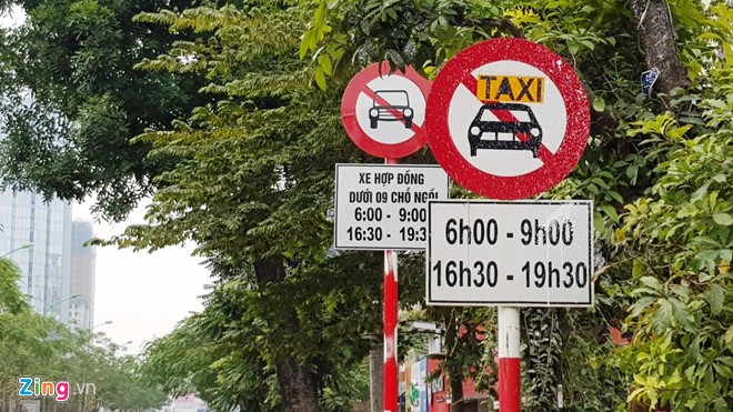 Tài xế Uber, Grab Hà Nội: 'Muốn về nhà chắc phải xé logo'