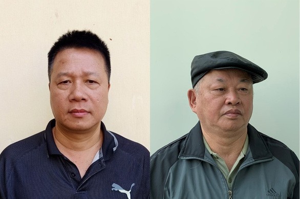 Bị cáo Trần Quang Tiến (trái) và Đào Quốc Việt (phải).