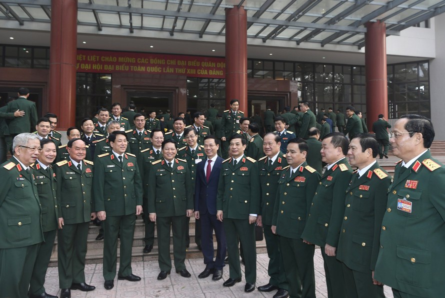 Lãnh đạo Quân ủy T.Ư, Bộ Quốc phòng, Bộ Thông tin và Truyền thông cùng các đại biểu tham dự buổi gặp mặt. 
