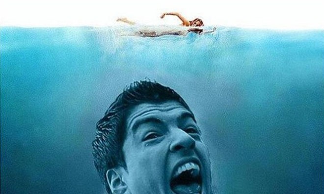 Sau cắn người, Suarez 'đóng phim'... Hàm cá mập