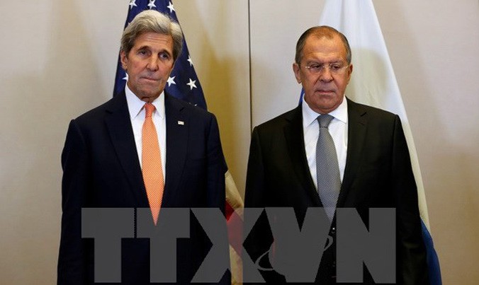 Ngoại trưởng Mỹ John Kerry (trái) và Ngoại trưởng Nga Sergei Lavrov trong một cuộc gặp ở Geneva, Thụy Sĩ ngày 9/9. Nguồn: AFP/TTXVN.