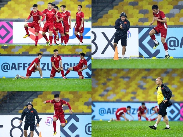 Tuyển Việt Nam dầm mưa tập luyện trước chung kết AFF Cup với Malaysia